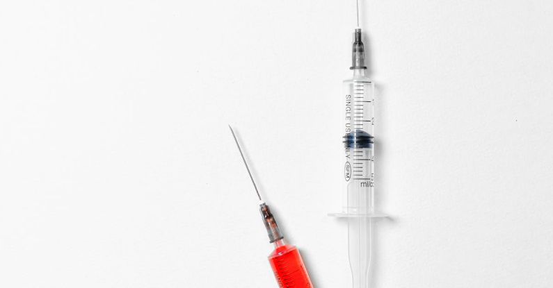 Needle - Syringes on White Background