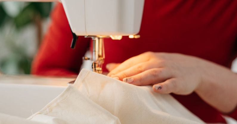 Hand Sewing - Woman Using a Sewing Machine